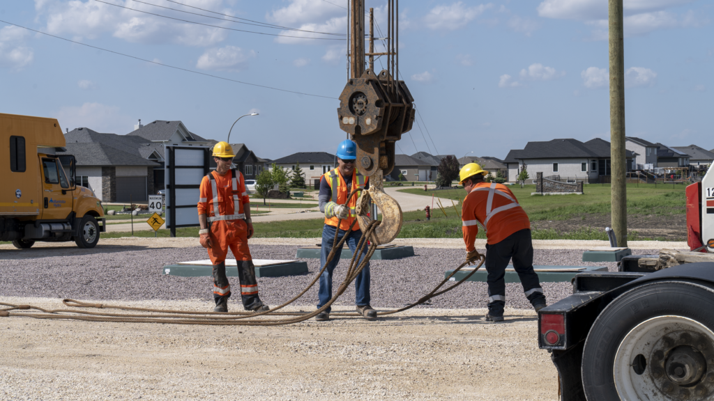 Attaching cables to a hook.