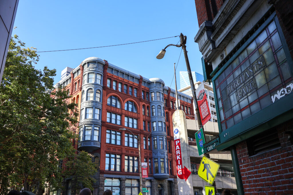 A blue and red building in downtown Seattle.